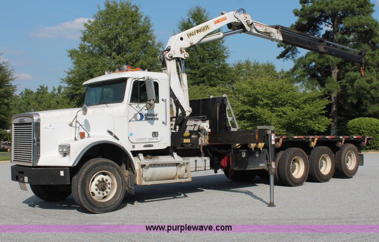 image for item I7757 2002 Freightliner FLD120SD triple axle semi truck with Palfinger knuckle boom crane