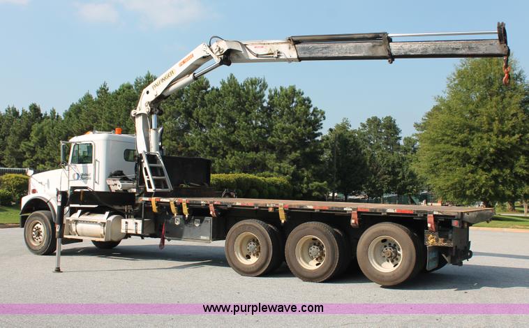 image for item I7757 2002 Freightliner FLD120SD triple axle semi truck with Palfinger knuckle boom crane