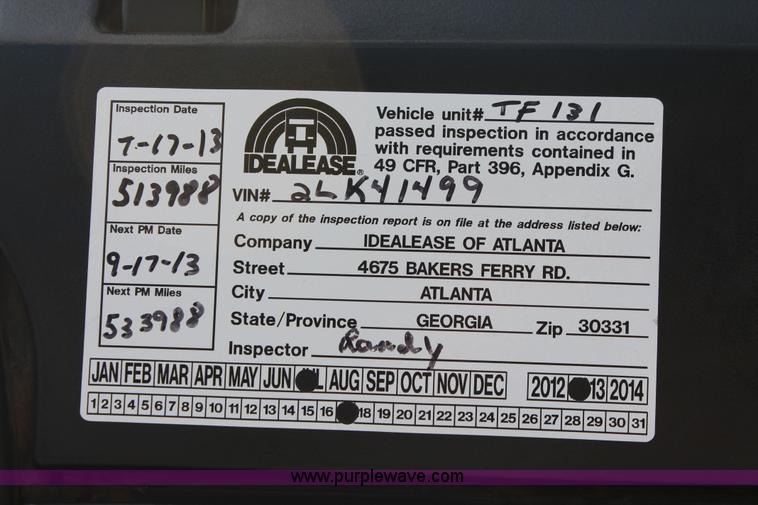 image for item I7757 2002 Freightliner FLD120SD triple axle semi truck with Palfinger knuckle boom crane