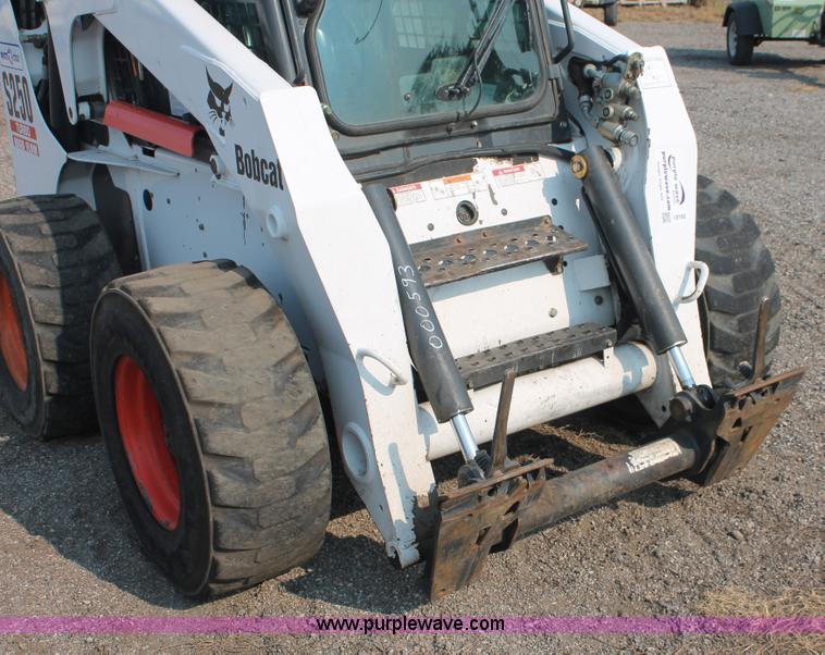 image for item I8192 2004 Bobcat S250 Turbo skid steer