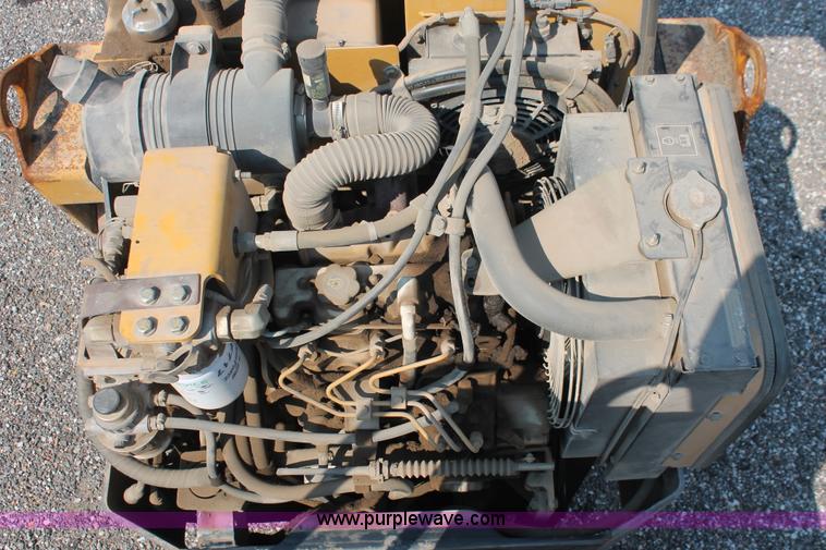 image for item I8217 2002 Caterpillar CB-224D articulated vibratory smooth drum roller