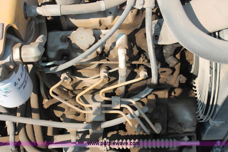 image for item I8217 2002 Caterpillar CB-224D articulated vibratory smooth drum roller