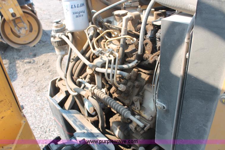 image for item I8217 2002 Caterpillar CB-224D articulated vibratory smooth drum roller