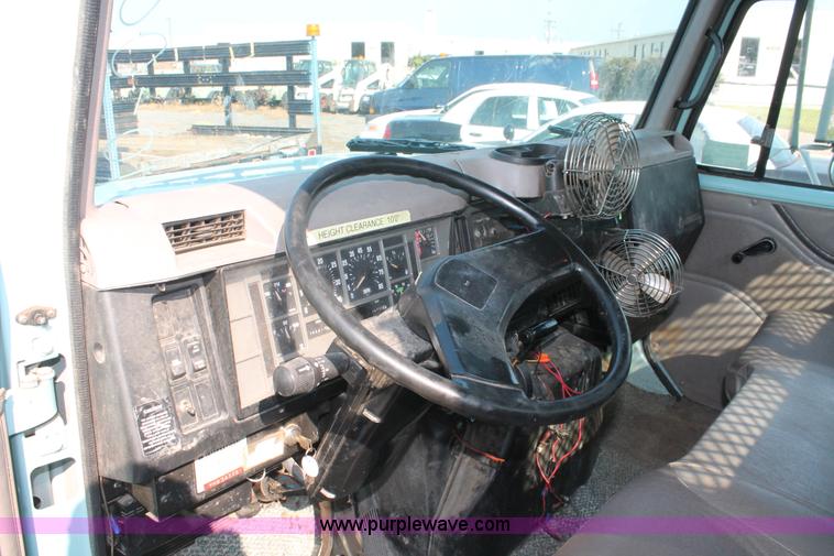 image for item I8245 2000 International 4700 Lo-Profile flatbed/crane body truck