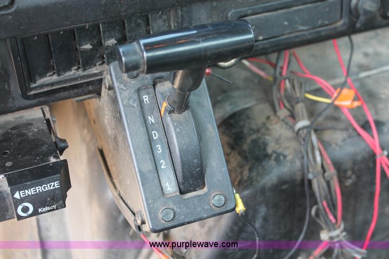 image for item I8245 2000 International 4700 Lo-Profile flatbed/crane body truck