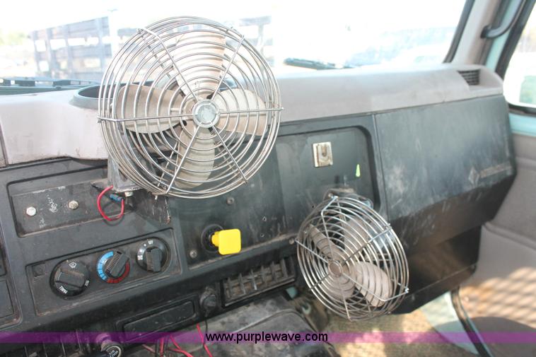 image for item I8245 2000 International 4700 Lo-Profile flatbed/crane body truck