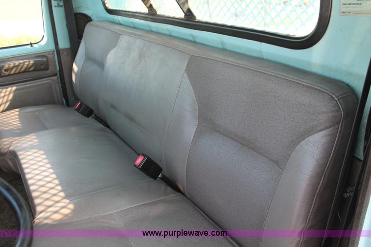 image for item I8245 2000 International 4700 Lo-Profile flatbed/crane body truck