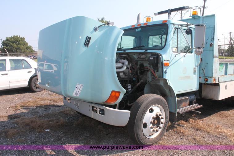 image for item I8245 2000 International 4700 Lo-Profile flatbed/crane body truck