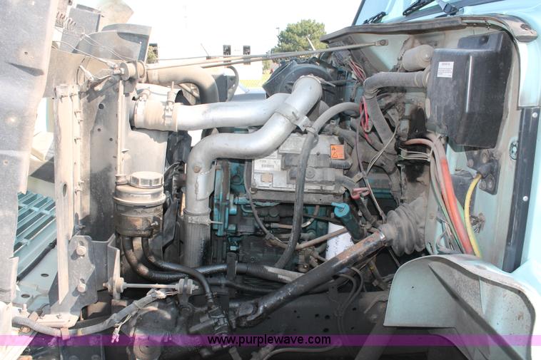 image for item I8245 2000 International 4700 Lo-Profile flatbed/crane body truck