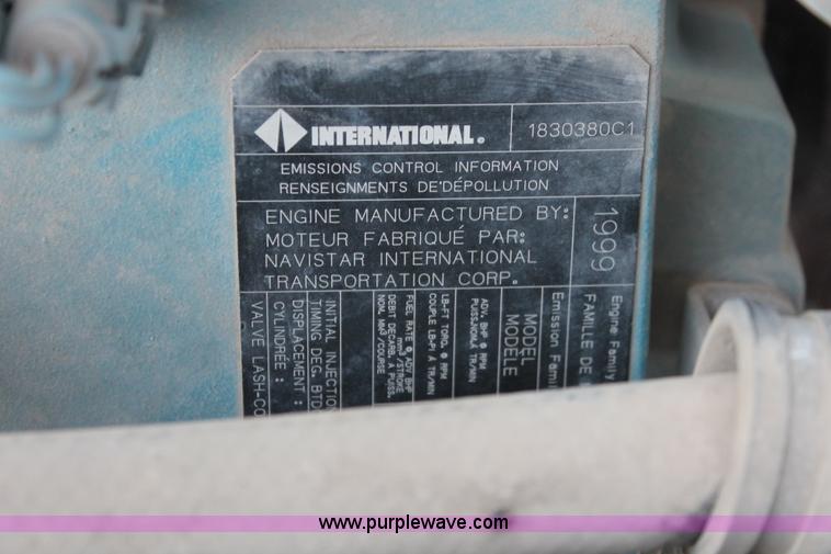 image for item I8245 2000 International 4700 Lo-Profile flatbed/crane body truck