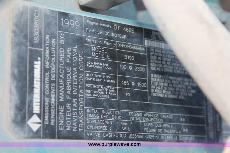 image for item I8245 2000 International 4700 Lo-Profile flatbed/crane body truck