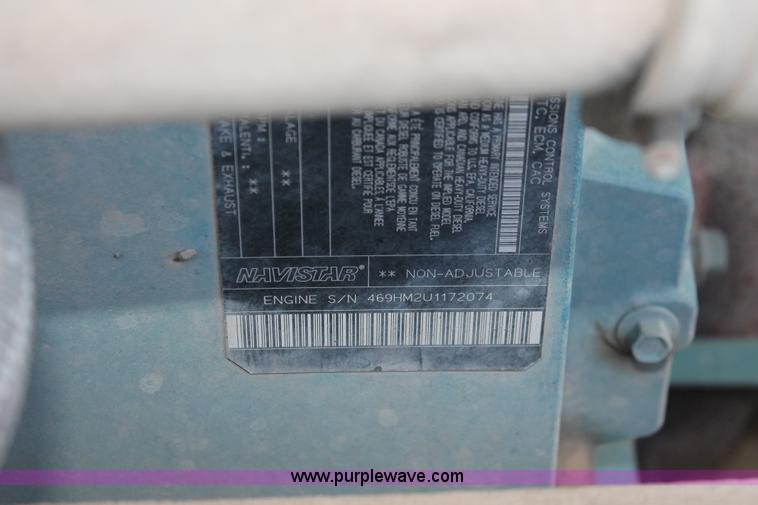 image for item I8245 2000 International 4700 Lo-Profile flatbed/crane body truck