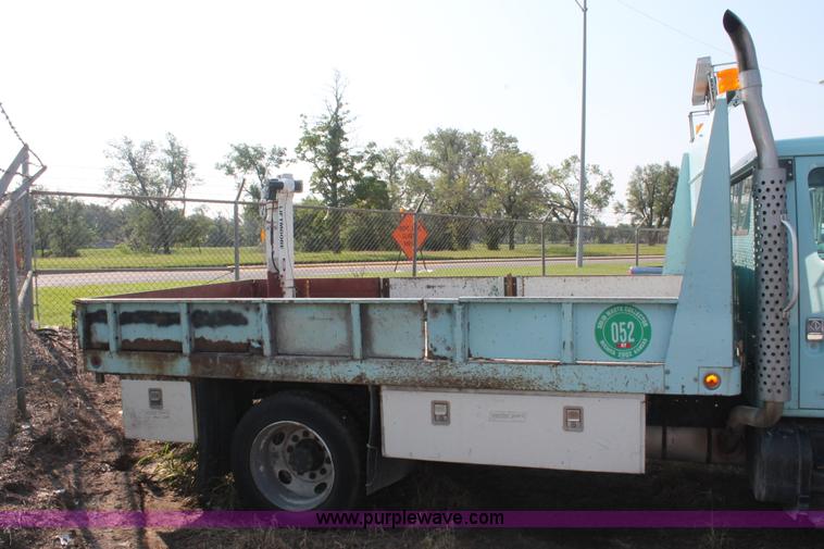 image for item I8245 2000 International 4700 Lo-Profile flatbed/crane body truck