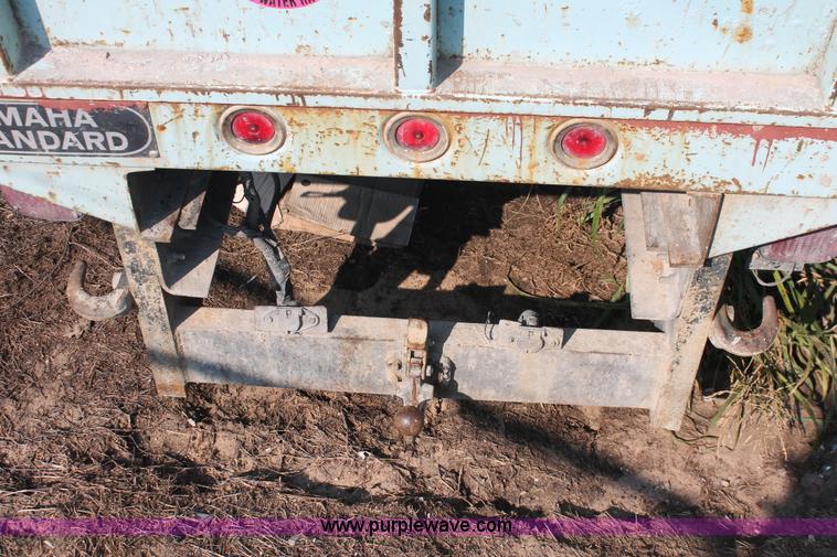 image for item I8245 2000 International 4700 Lo-Profile flatbed/crane body truck