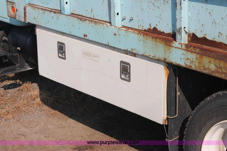 image for item I8245 2000 International 4700 Lo-Profile flatbed/crane body truck