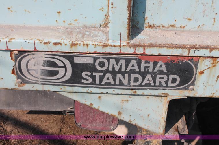 image for item I8245 2000 International 4700 Lo-Profile flatbed/crane body truck