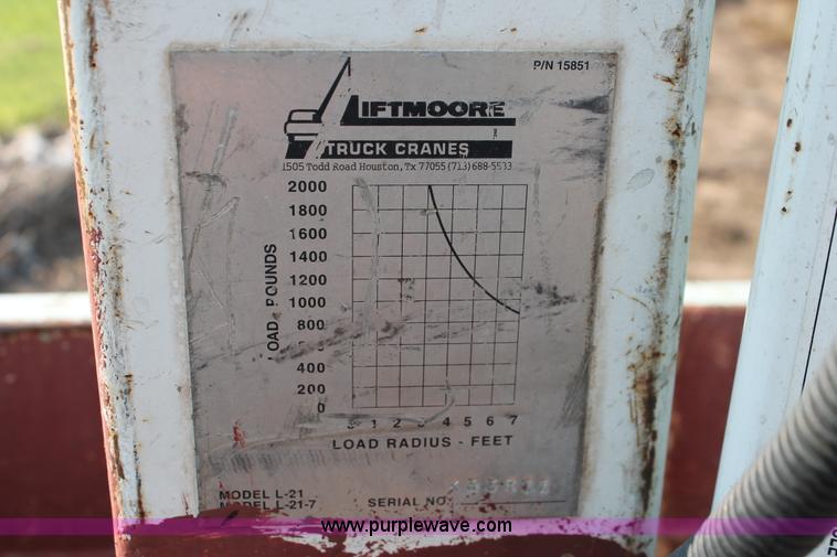 image for item I8245 2000 International 4700 Lo-Profile flatbed/crane body truck
