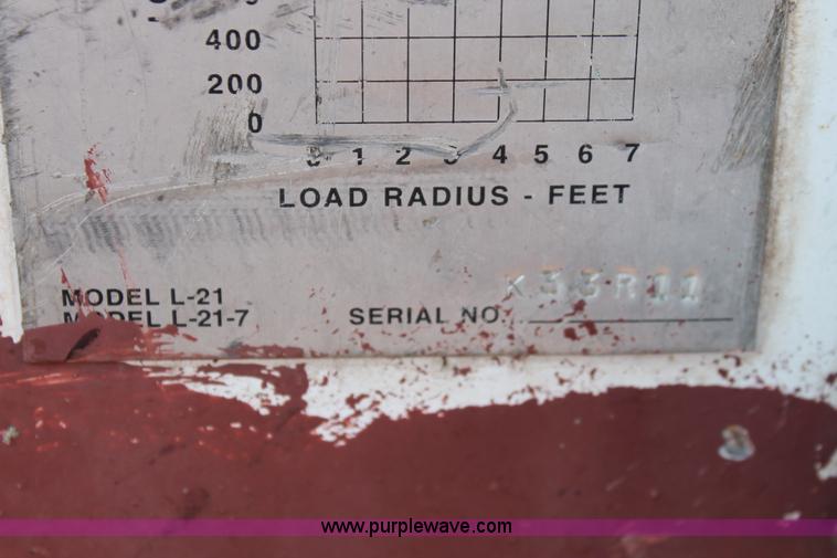 image for item I8245 2000 International 4700 Lo-Profile flatbed/crane body truck