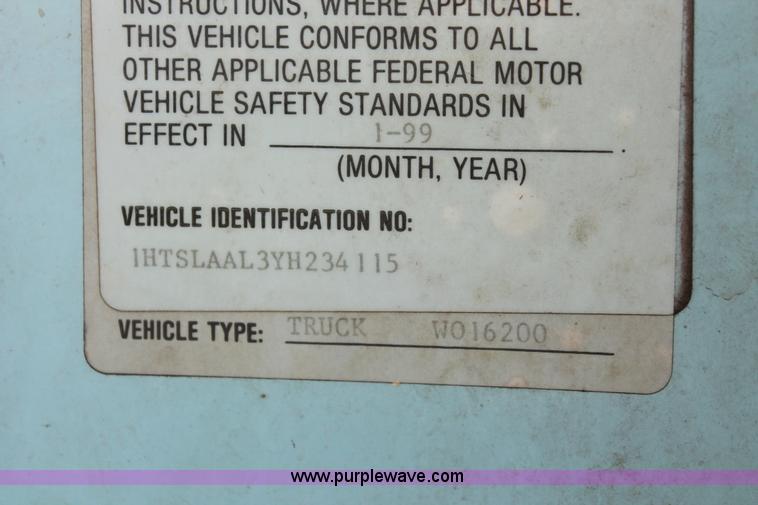 image for item I8245 2000 International 4700 Lo-Profile flatbed/crane body truck