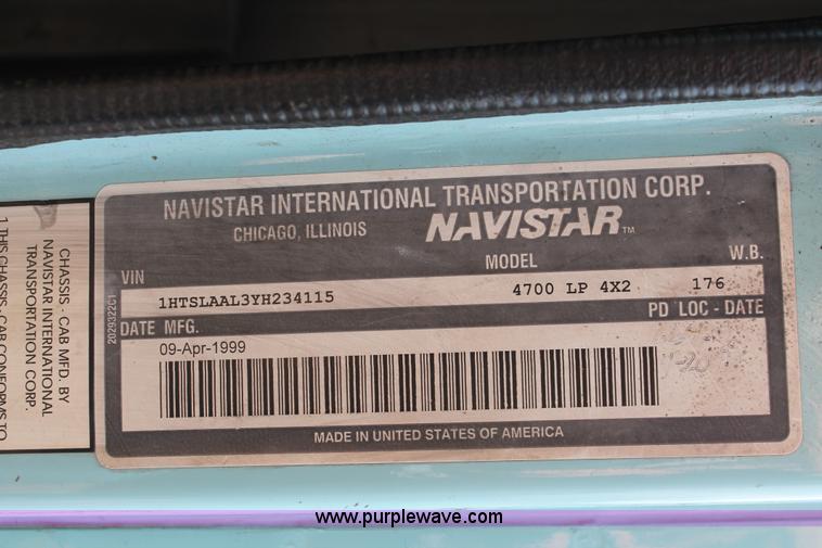 image for item I8245 2000 International 4700 Lo-Profile flatbed/crane body truck