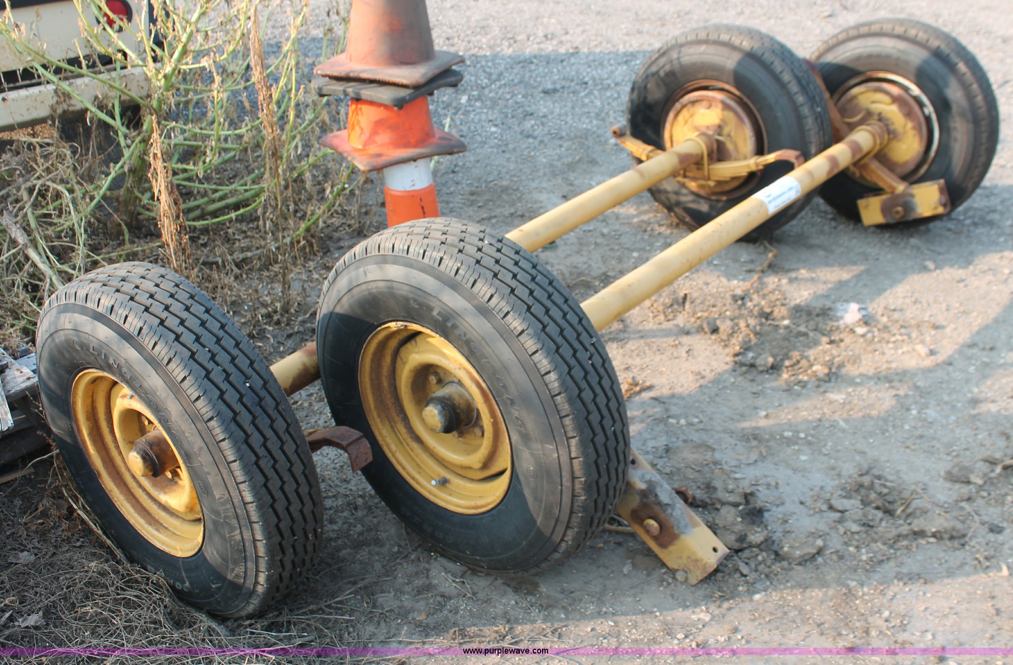 (2) axles and wheels in Wichita, KS Item I8201 sold Purple Wave