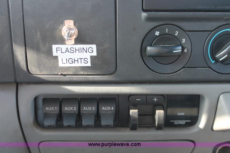 image for item H3503 2006 Ford F450 XL Super Duty stake bed truck