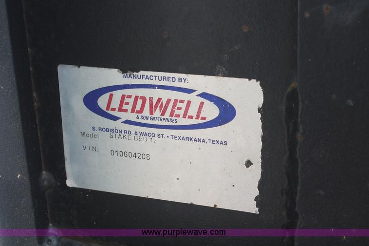 image for item H3503 2006 Ford F450 XL Super Duty stake bed truck