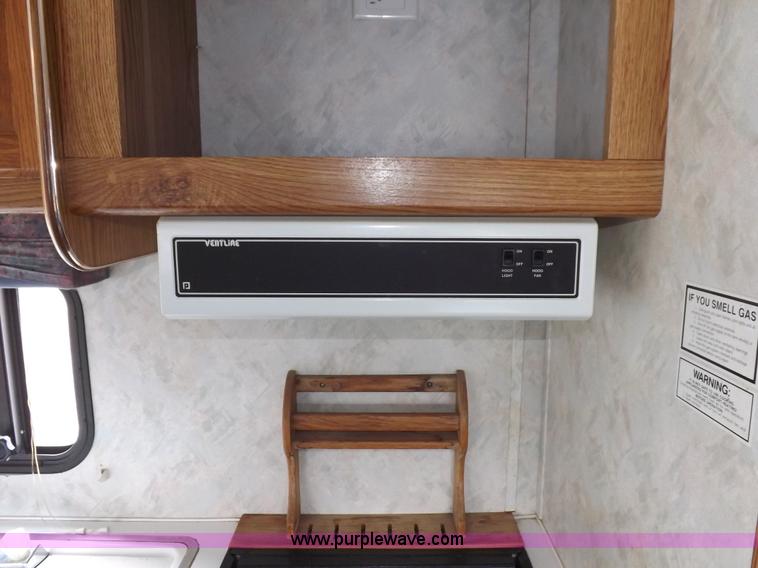 image for item I7650 1997 Sand Piper 36' travel trailer