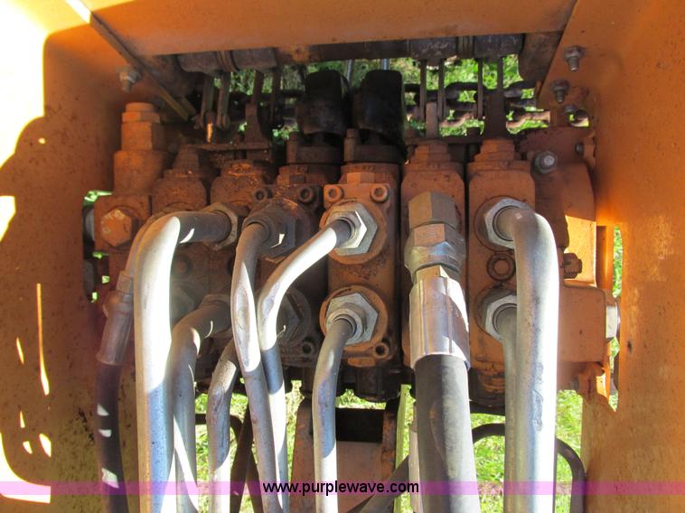 image for item G8551 Case backhoe attachment