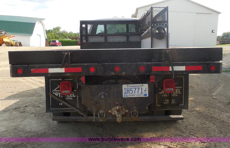 image for item G8981 2000 Ford F650 Super Duty flatbed truck
