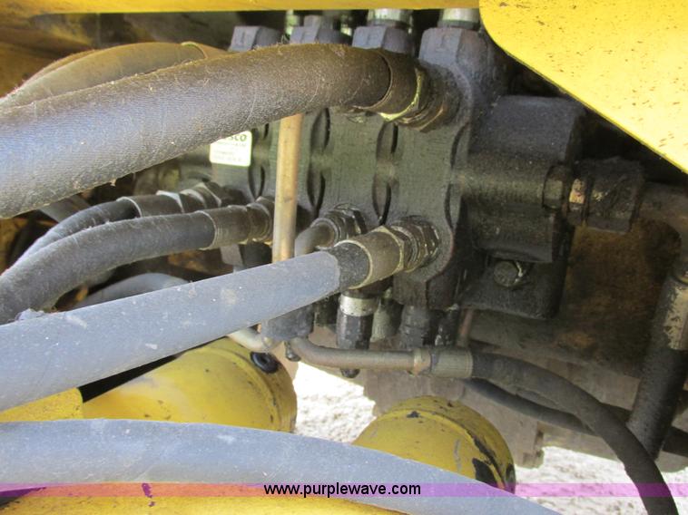 image for item G8997 2001 New Holland LB110 backhoe