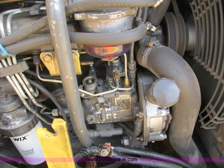 image for item G8997 2001 New Holland LB110 backhoe