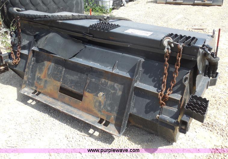 image for item H9809 Caterpillar BT18 skid steer broom