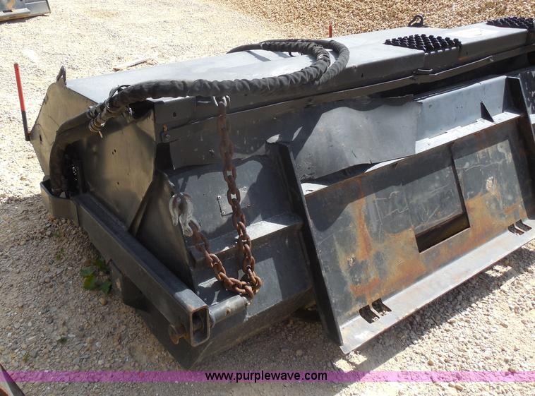 image for item H9809 Caterpillar BT18 skid steer broom