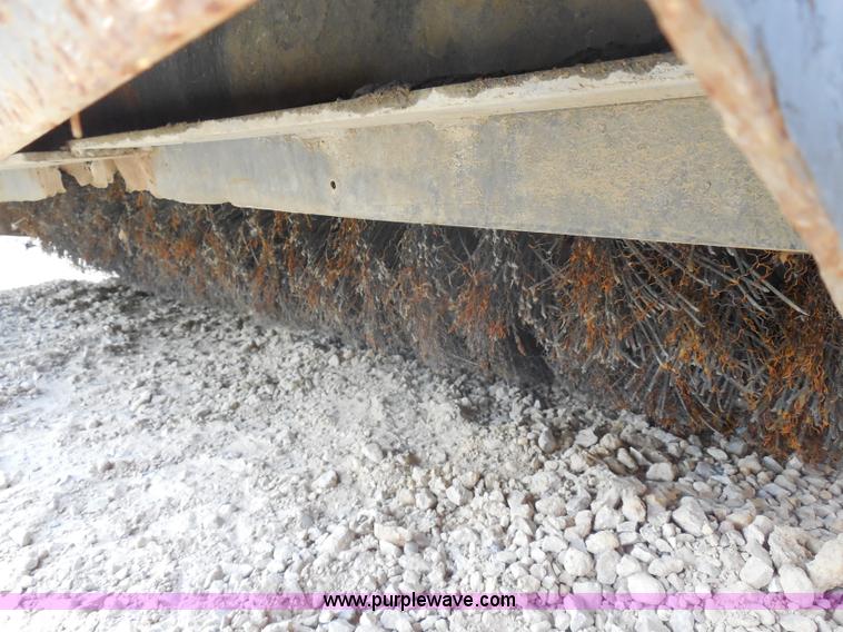 image for item H9809 Caterpillar BT18 skid steer broom