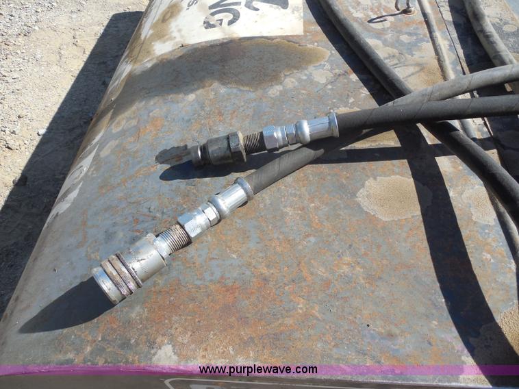 image for item H9810 Sweepster 64" sweeper skid steer attachment