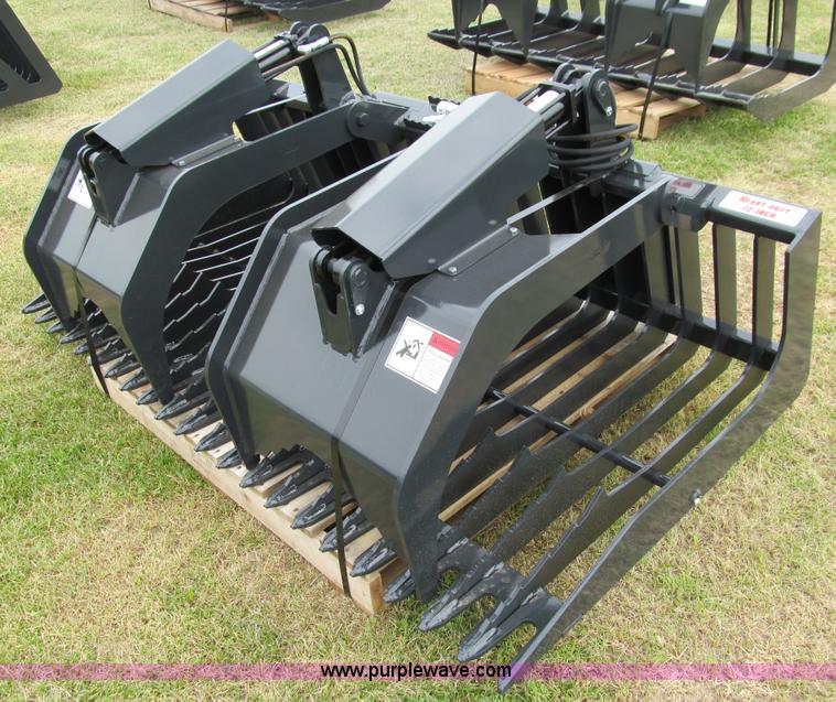 Stout 72" skid steer rock bucket/brush grapple in Knapp, WI Item