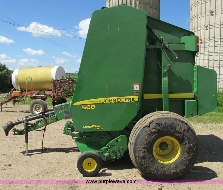 image for item E5174 2010 John Deere 568 round baler