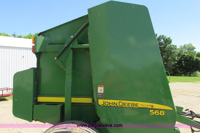 image for item E5174 2010 John Deere 568 round baler