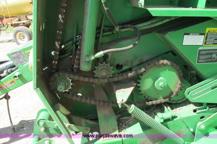 image for item E5174 2010 John Deere 568 round baler