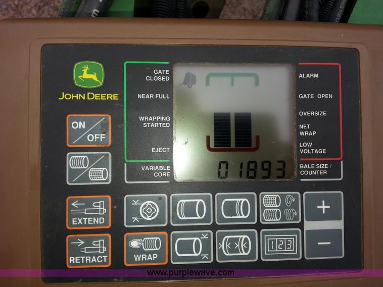 image for item E5174 2010 John Deere 568 round baler