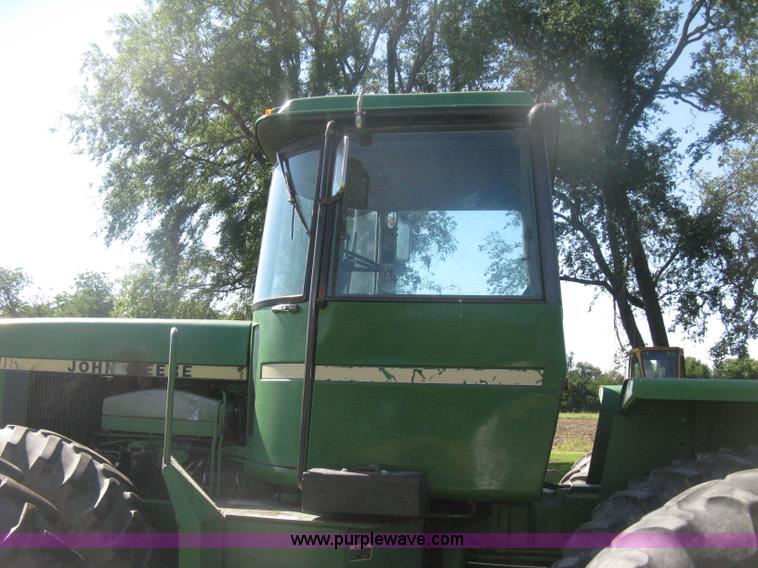 image for item H6454 1983 John Deere 8450 4WD tractor