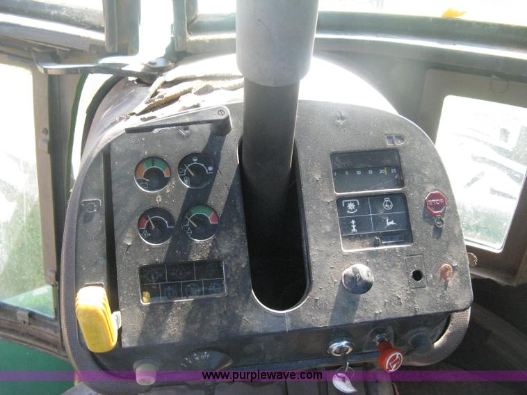 image for item H6454 1983 John Deere 8450 4WD tractor