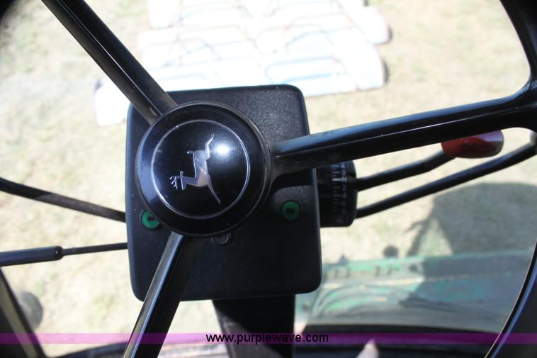 image for item H7320 1987 John Deere 7720 Titan II RWA combine