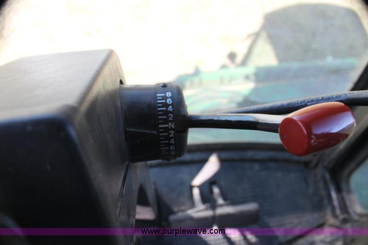 image for item H7320 1987 John Deere 7720 Titan II RWA combine