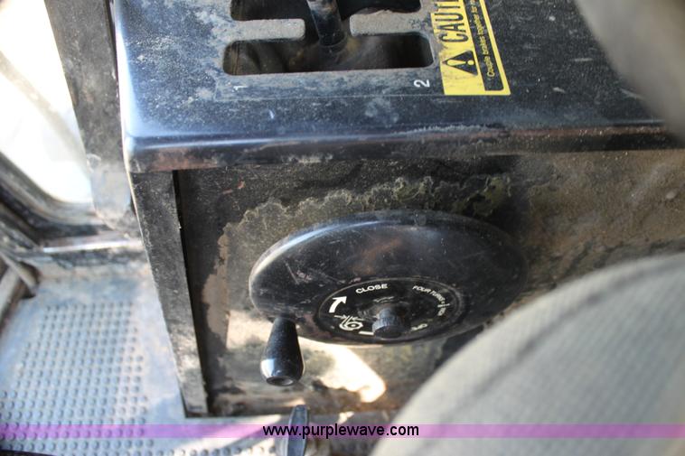 image for item H7320 1987 John Deere 7720 Titan II RWA combine