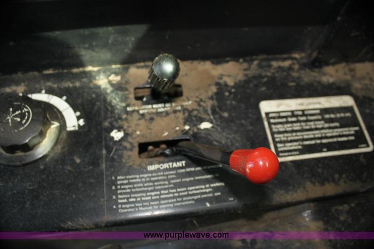 image for item H7320 1987 John Deere 7720 Titan II RWA combine