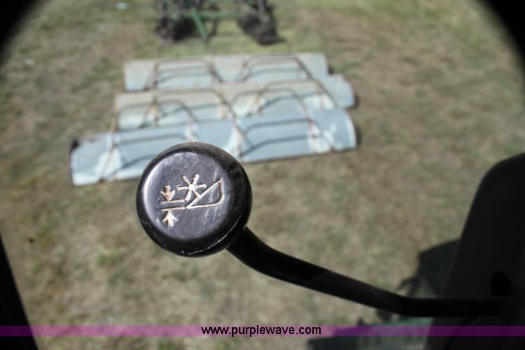 image for item H7320 1987 John Deere 7720 Titan II RWA combine