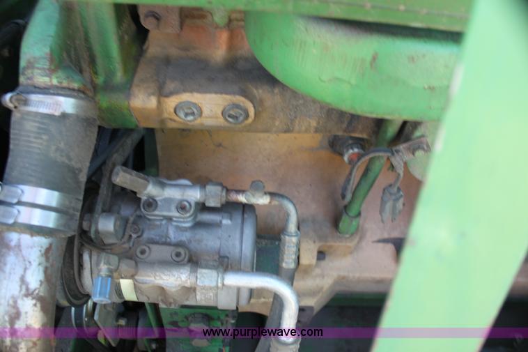 image for item H7320 1987 John Deere 7720 Titan II RWA combine