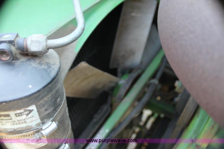 image for item H7320 1987 John Deere 7720 Titan II RWA combine